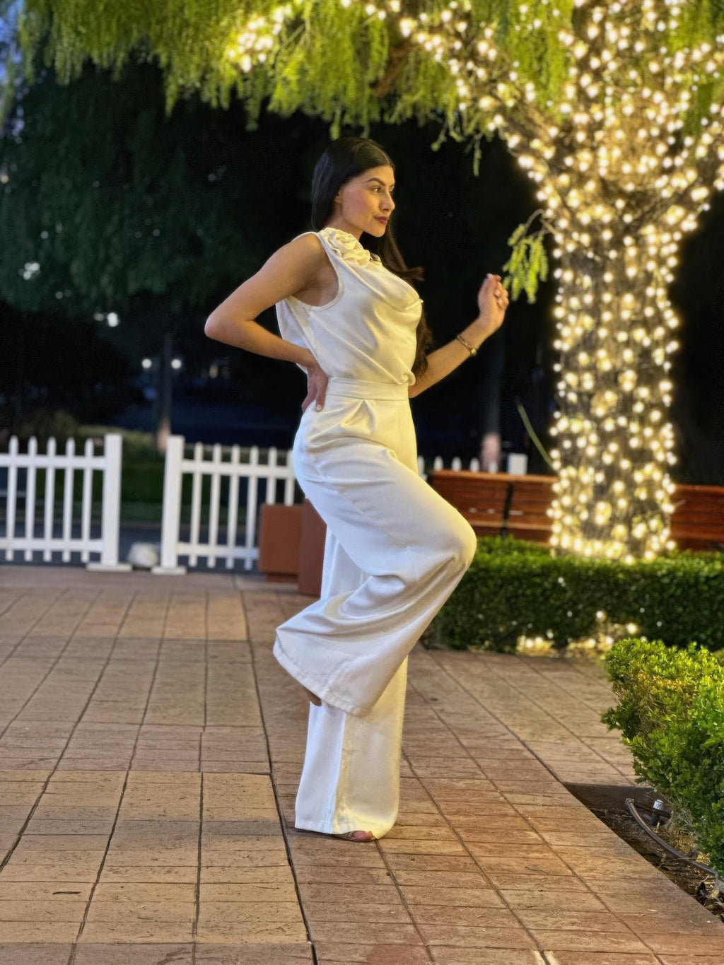 Satin light cream sleeveless top and wide-leg pants, side view