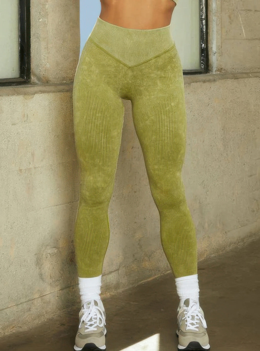 Olive high-waist cropped leggings with ribbed texture; full leg view