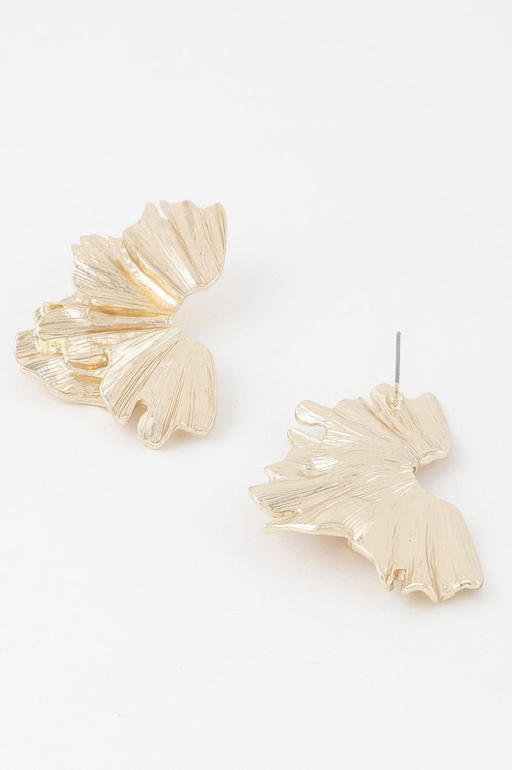 Gold flower drop earrings, side view of layered petals on stud posts