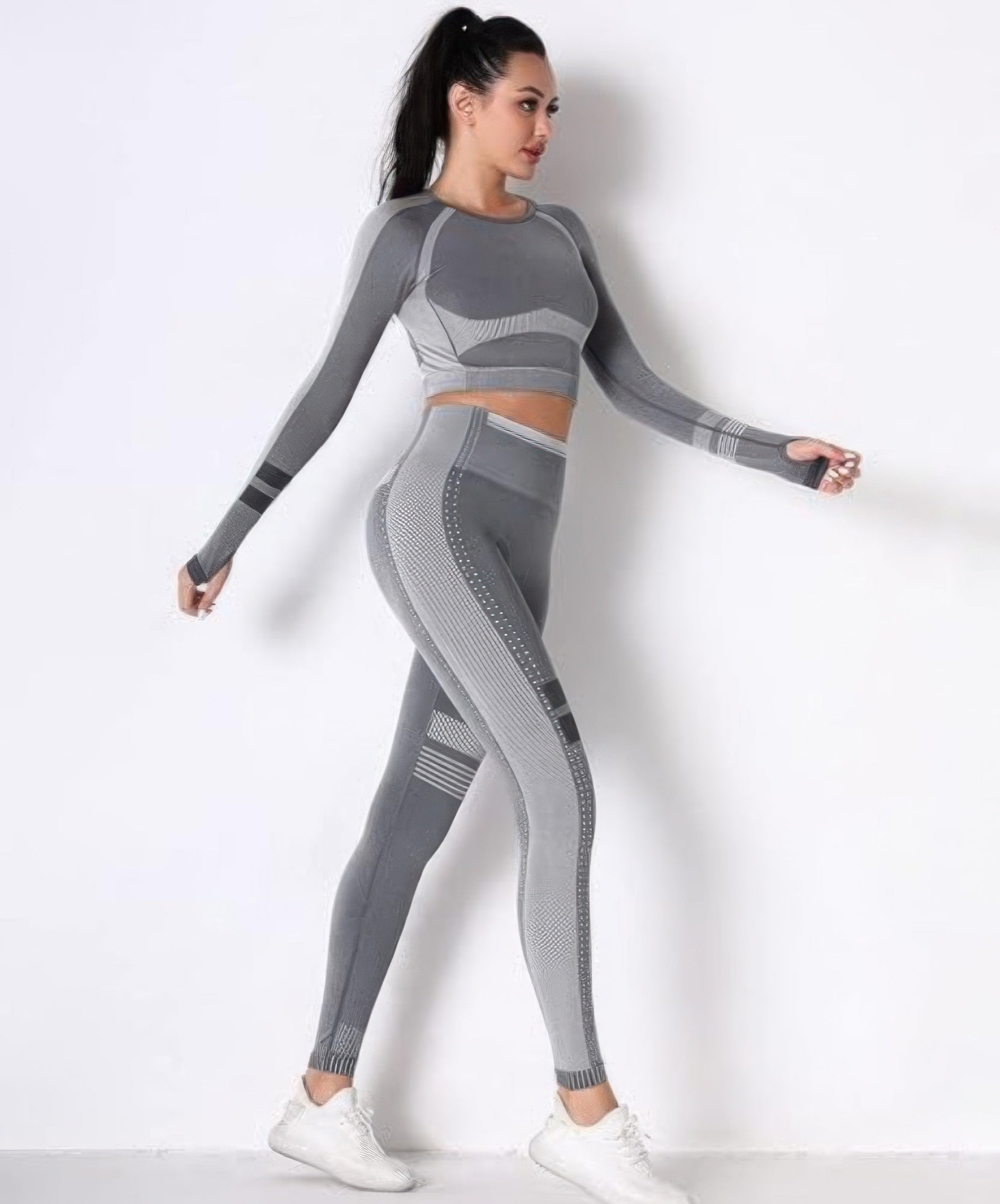 Seamless yoga set full-body: grey leggings with dotted side panel and striped detail lines.