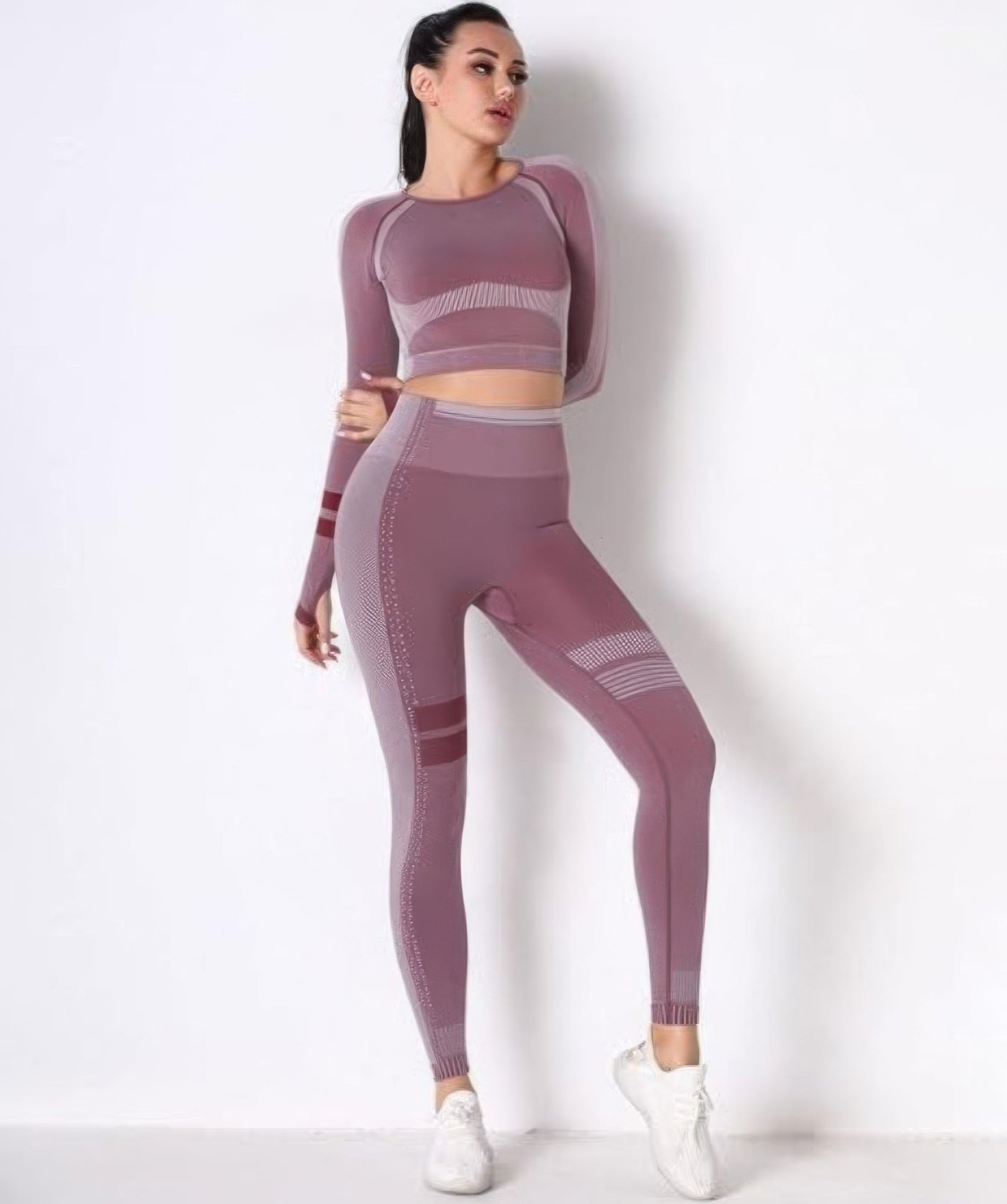 Seamless long-sleeve yoga set, mauve crop top and matching leggings with paneling