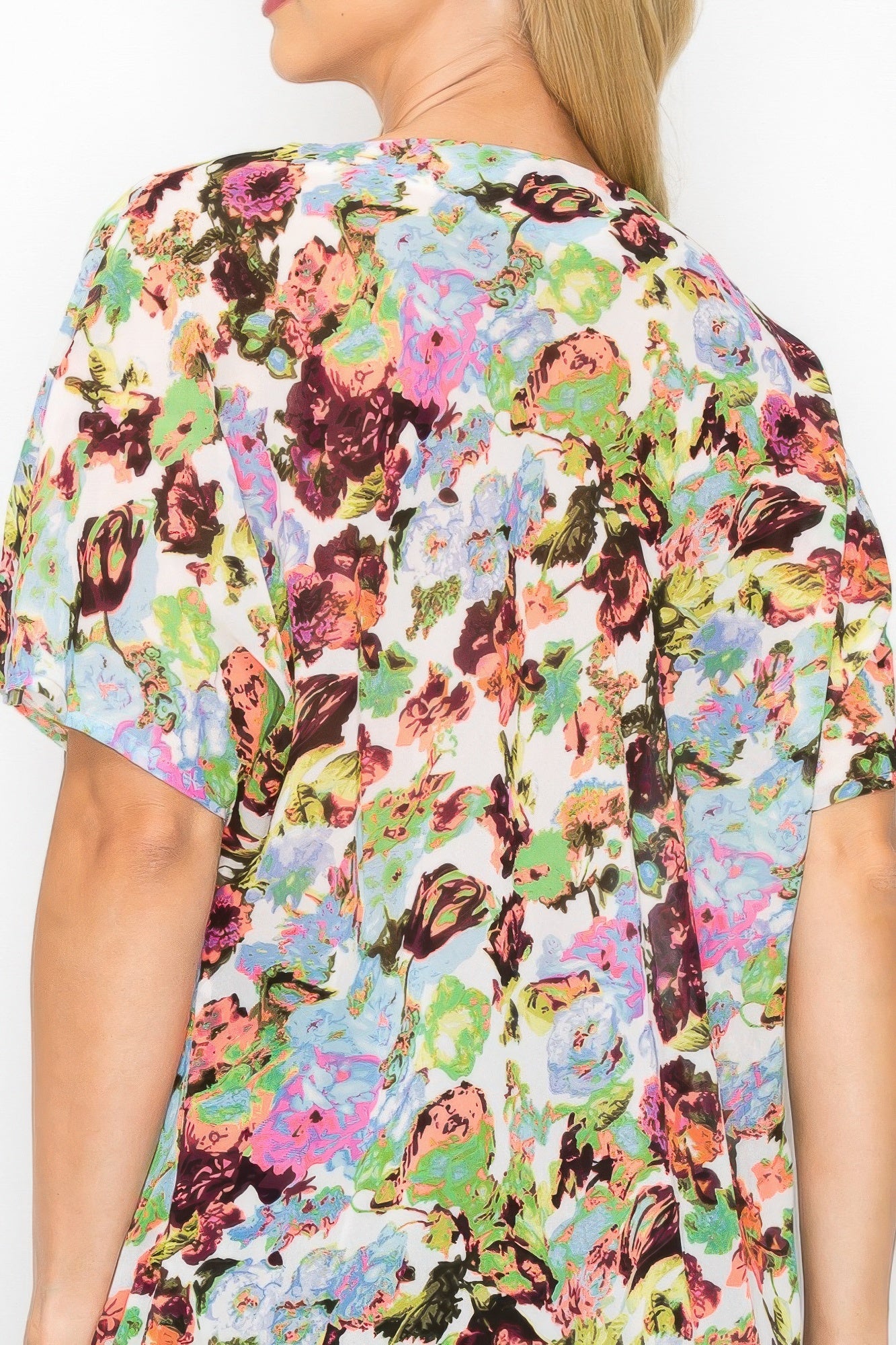 Back of neon floral top with short sleeves and all-over bright print