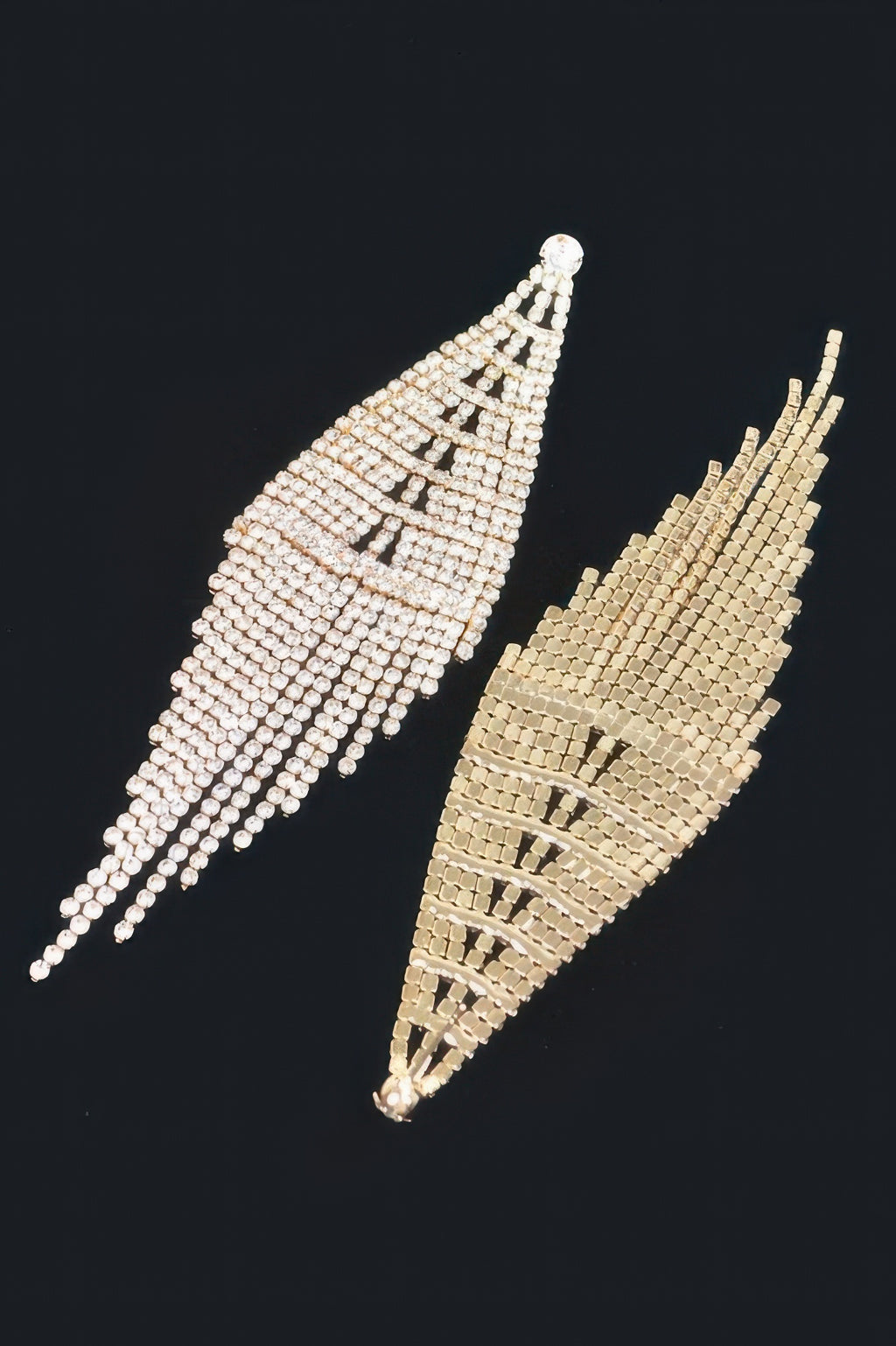 Drop earrings with rhinestone strands in gold-tone and silver-tone, tiered fringe