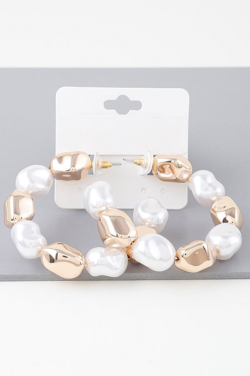 Shiny N Pearl hoop earrings with white faux pearls and gold-tone links