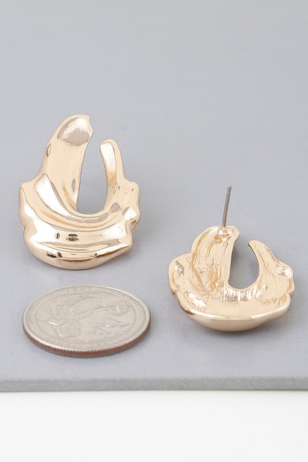 Gold ripple drop earrings with post and curved layered ripple design