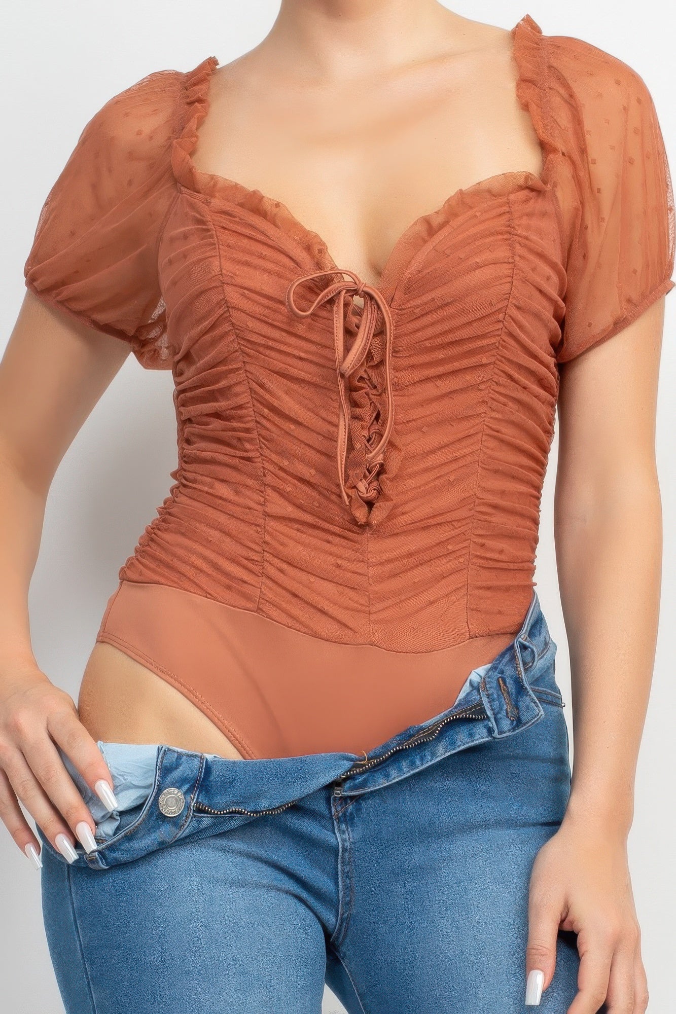 Cocoa brown shirred mesh bodysuit with lace-up front and puff sleeves