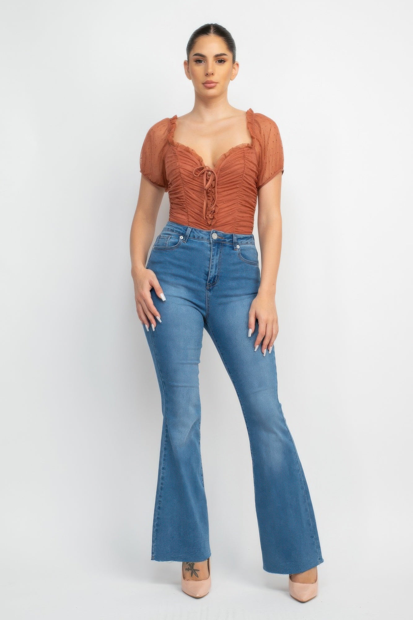 Cocoa brown shirred mesh sleeve bodysuit with ruched bodice and lace-up detail