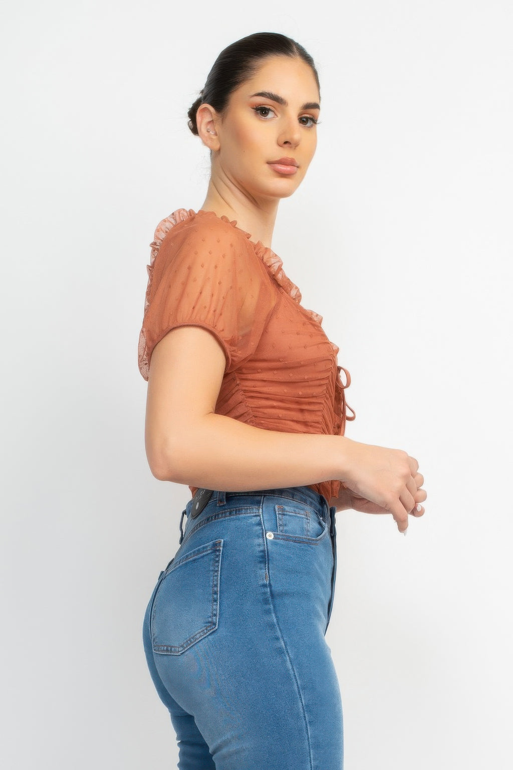 Cocoa brown mesh puff-sleeve bodysuit with lace-up neckline, ruched texture