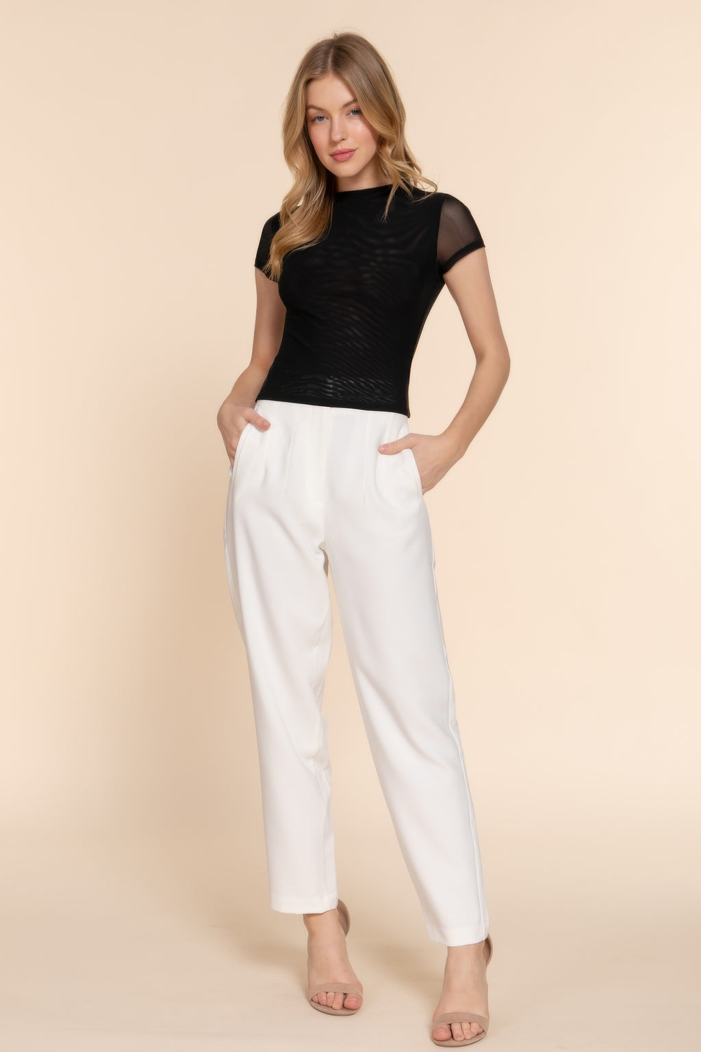 Black short cap-sleeve 2-ply mesh top with high neckline, fitted silhouette.
