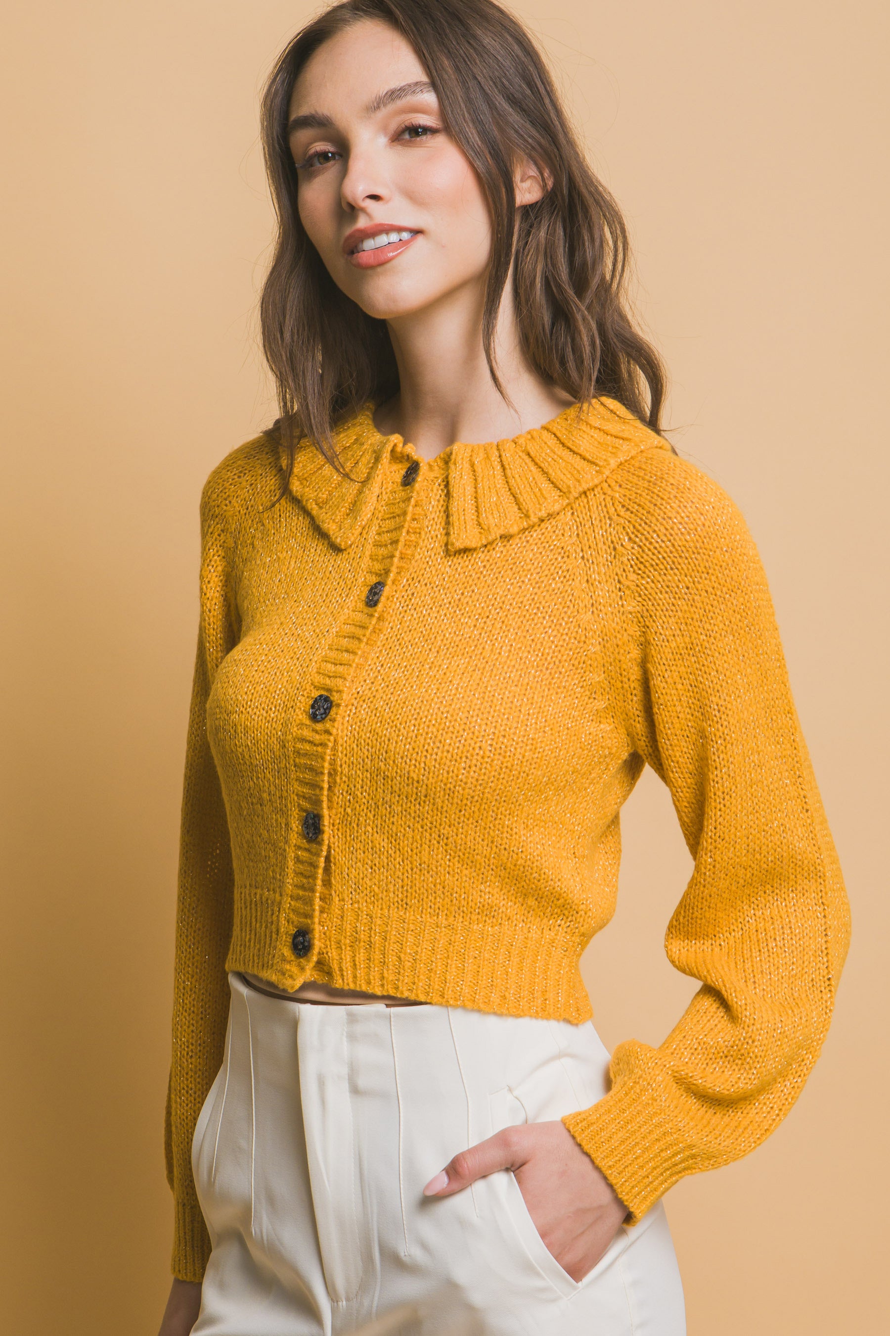 Mustard short knit sweater with ribbed collar and buttoned front