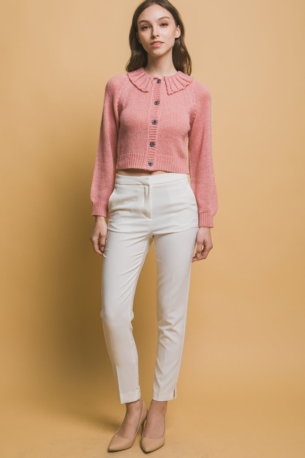 Pink long-sleeve cropped sweater with high collar, button front, ribbed hem