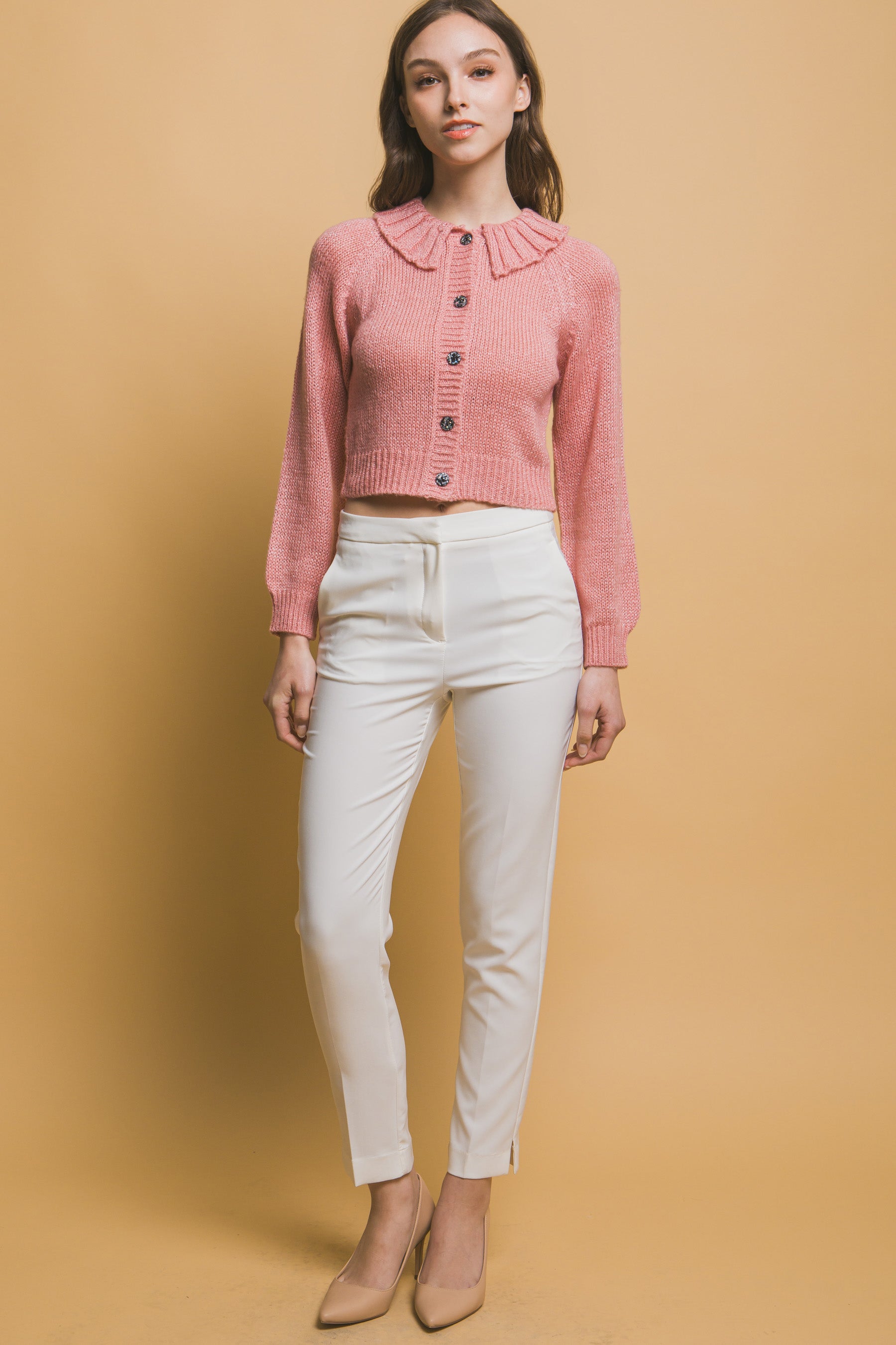 Pink long-sleeve cropped sweater with high collar, button front, ribbed hem