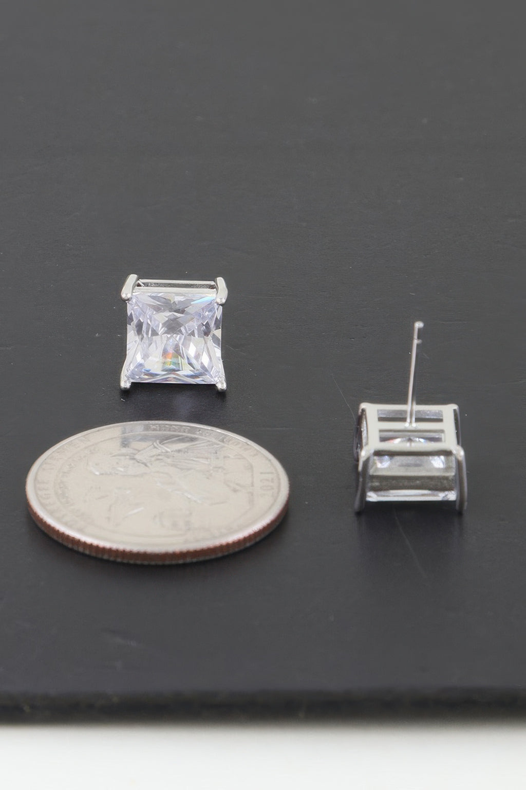 Single square cubic zirconia stud earring, clear stone, silver-toned prongs