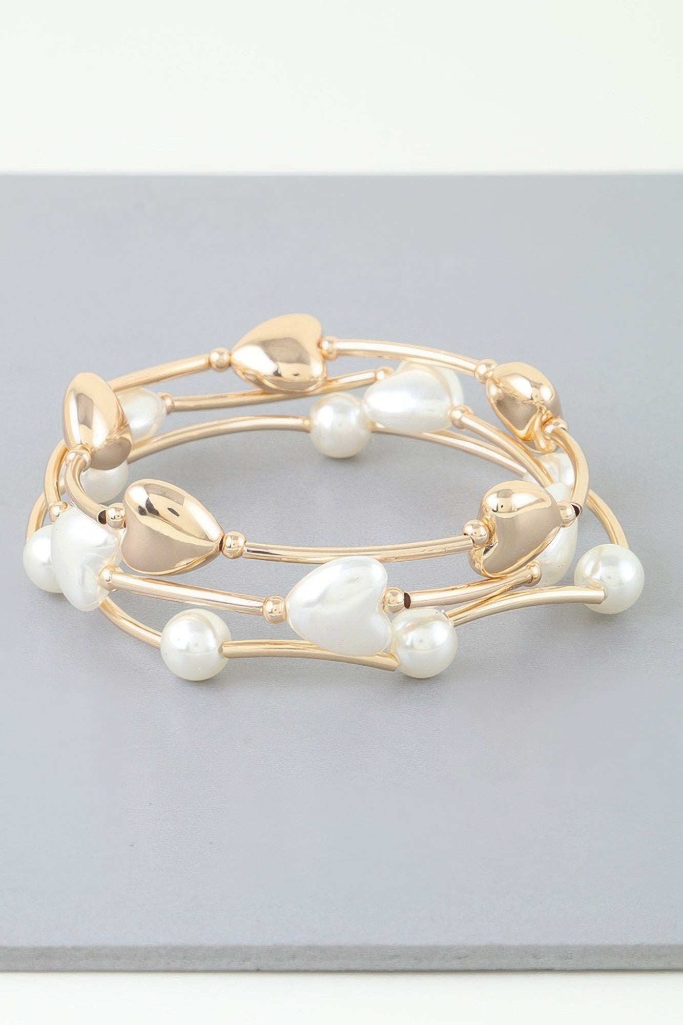 Heart beaded wrap bracelet, gold-tone with cream pearl-like beads in stacked bands