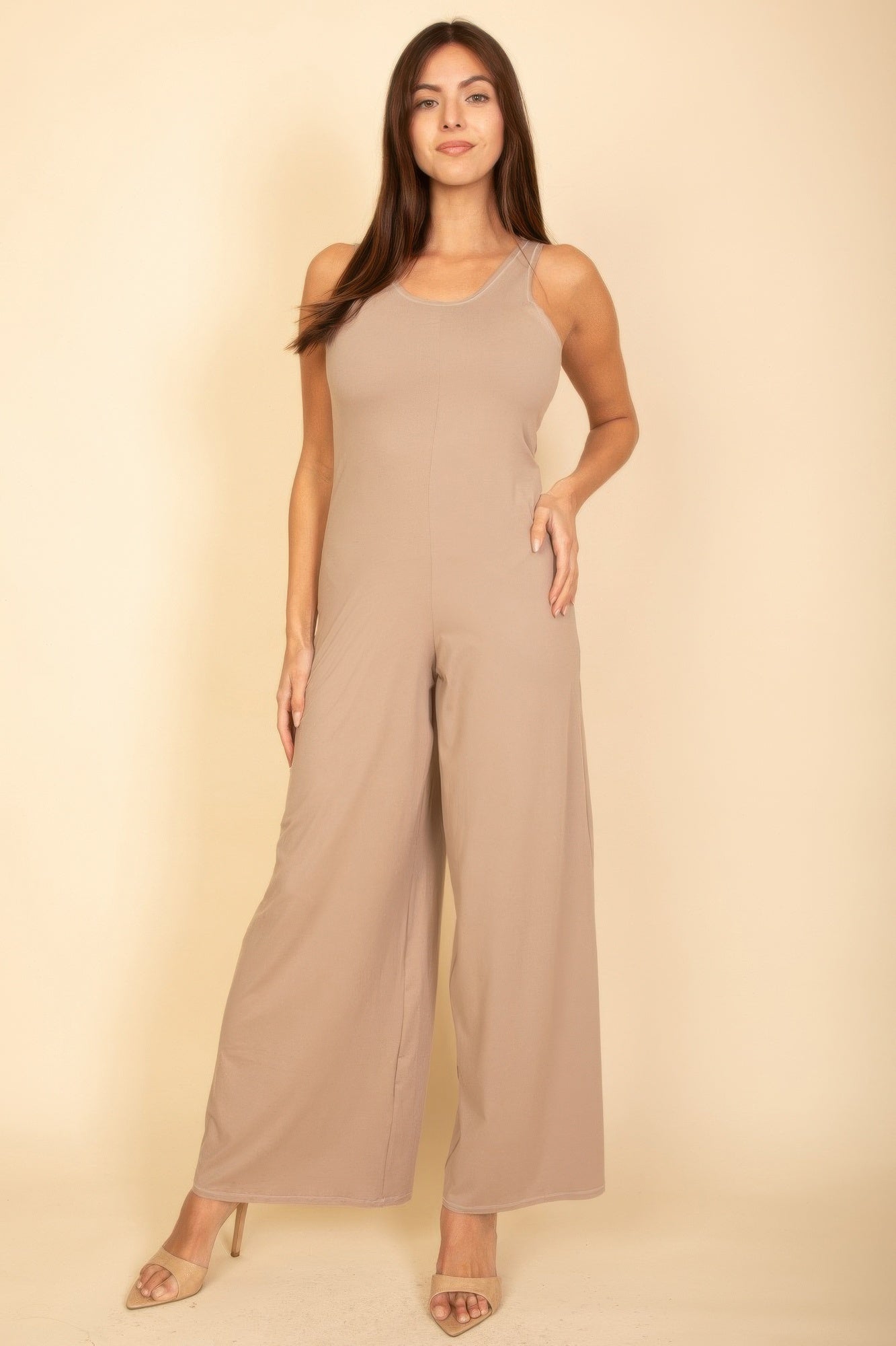 Taupe sleeveless wide-leg jumpsuit with scoop neck and relaxed straight-leg fit