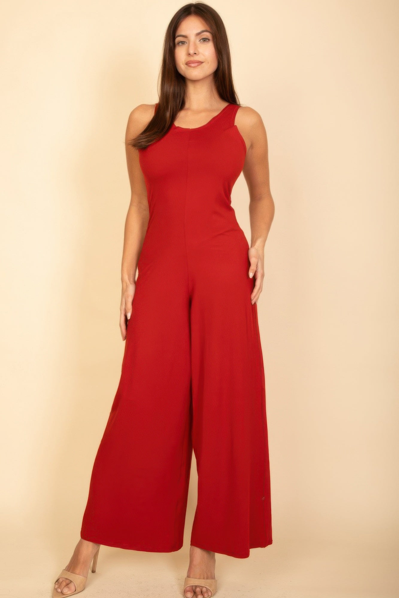 Red sleeveless wide-leg jumpsuit with scoop neck and wide palazzo legs