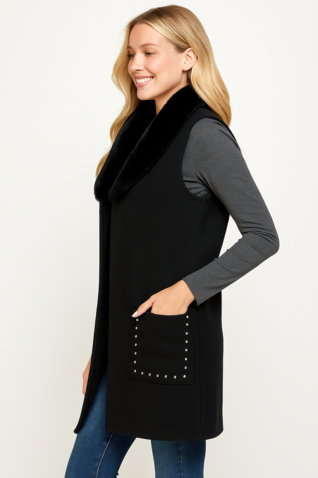 Faux fur–trim sleeveless vest, side view with studded front pocket