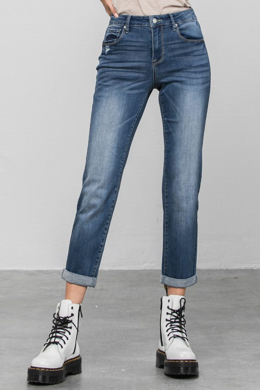 Dark slim boyfriend jeans from the back, belt loops, back yoke, straight cropped hem.