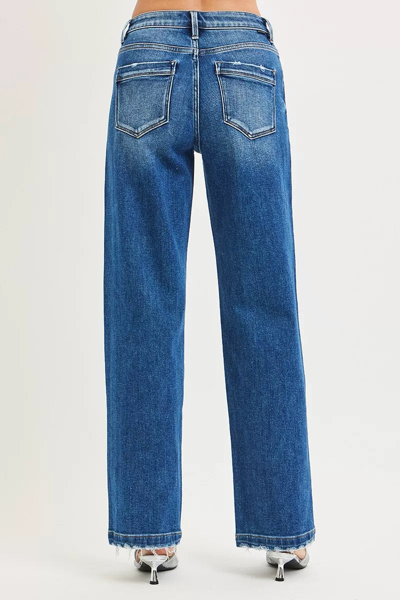 Back view of baggy blue jeans with belt loops and two back pockets