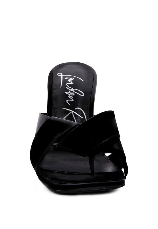 Black toe ring heeled sandals with intertwined straps across the front
