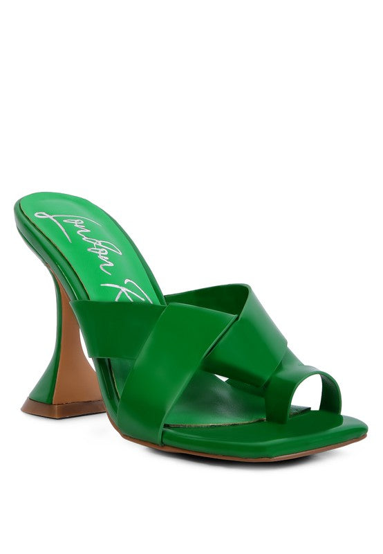 Green heeled mule sandals with intertwined toe ring straps and sculpted block heel