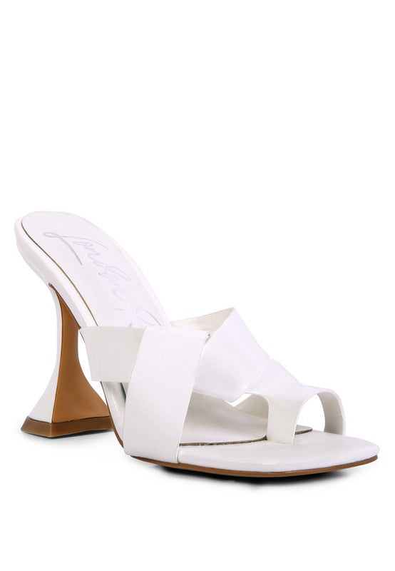 White heeled sandals with crisscross toe ring strap and open toe