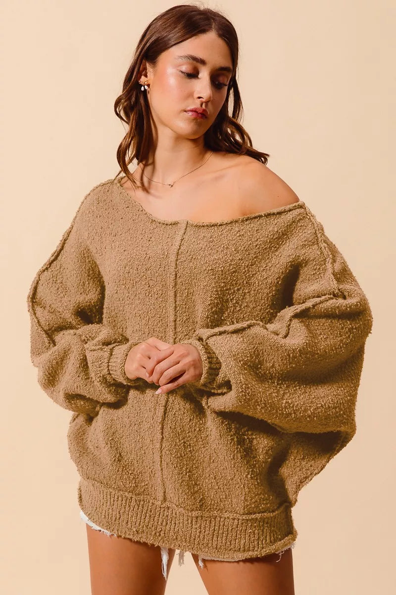 Taupe bouclé slouchy sweater with exposed seams, wide off-shoulder neckline, loose fit