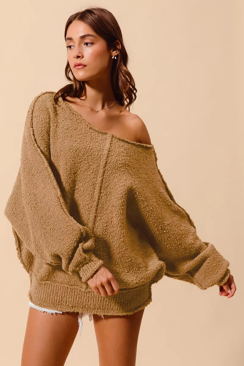 Taupe bouclé slouchy sweater with exposed seam detail, off-shoulder neckline, dropped sleeves