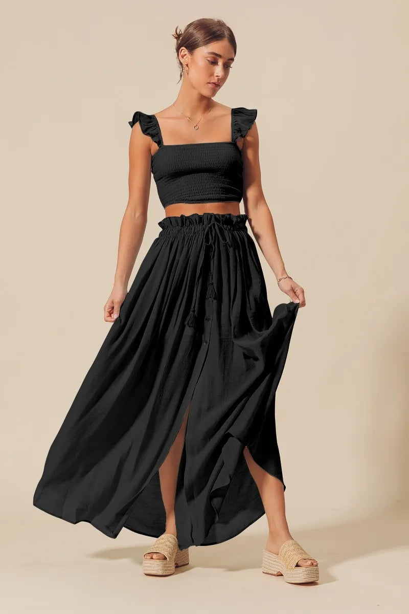 Black smocked crop top with ruffle cap sleeves and flowy maxi skirt set