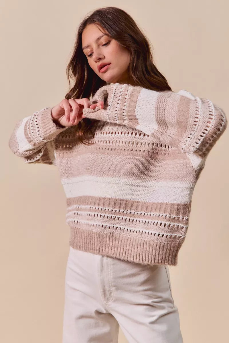 Taupe variegated stripe knit sweater with crew neck and ribbed cuffs