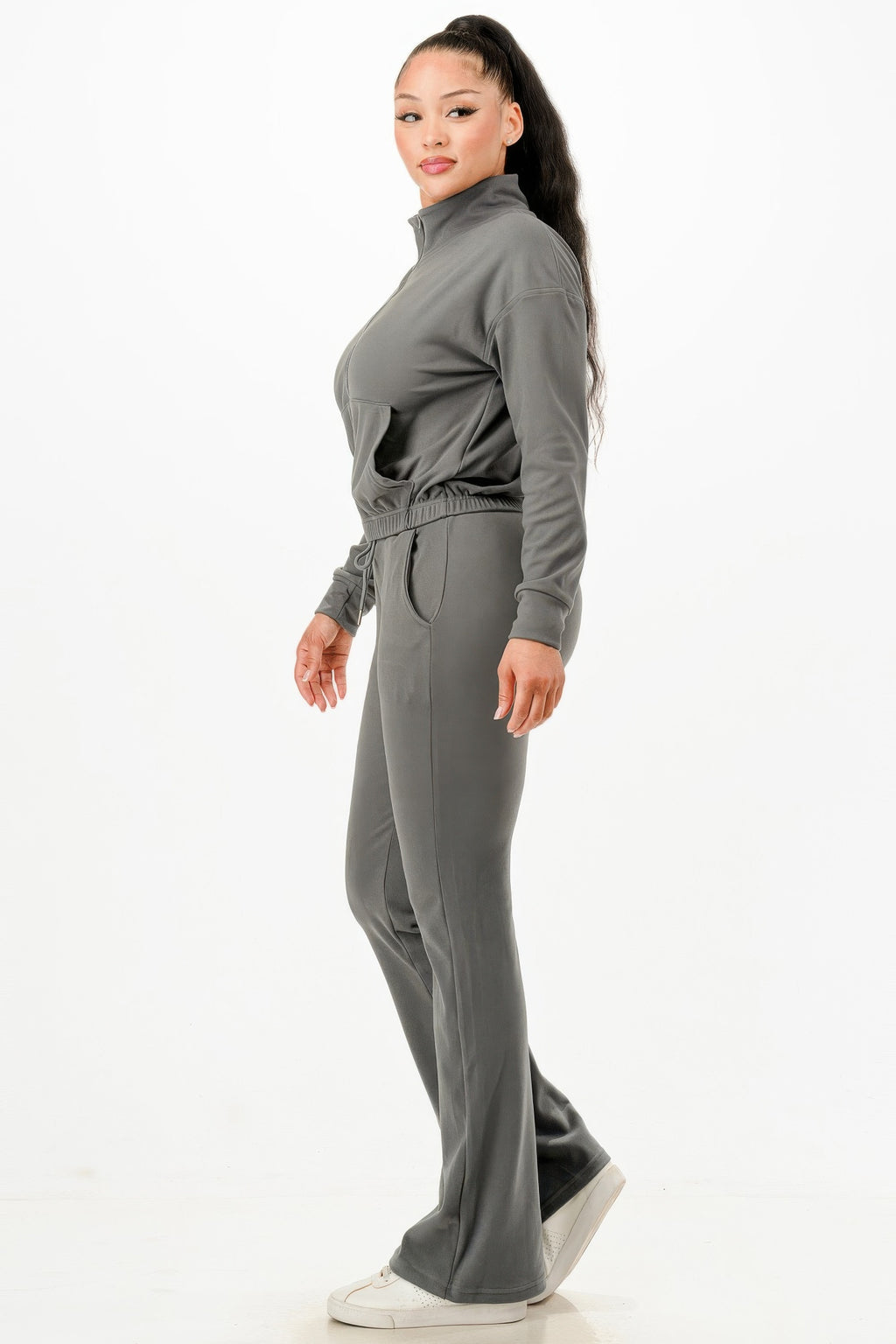 Gray track suit set side profile: zip jacket and flared pants with drawstring waist.