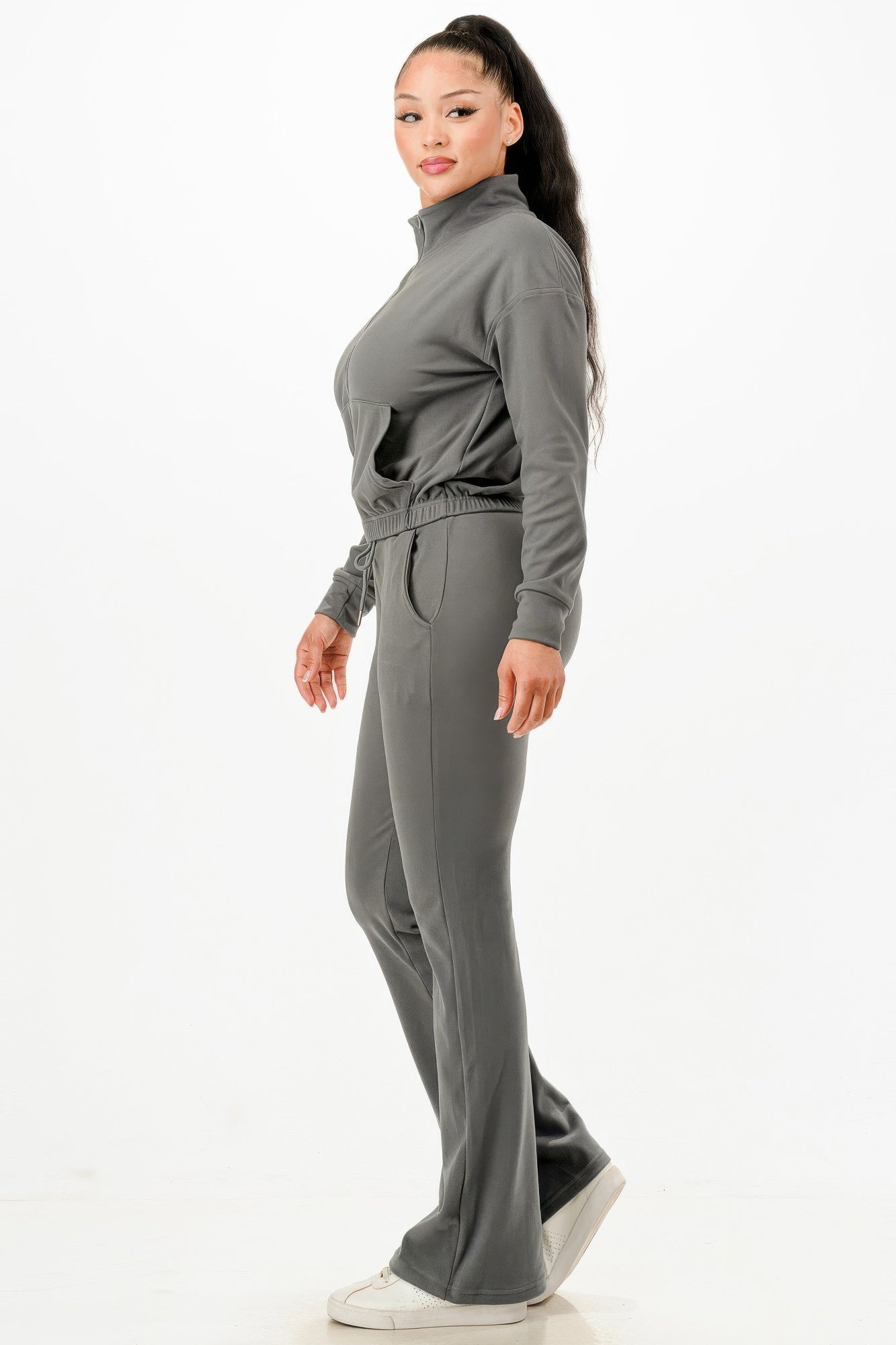 Gray track suit set side profile: zip jacket and flared pants with drawstring waist.