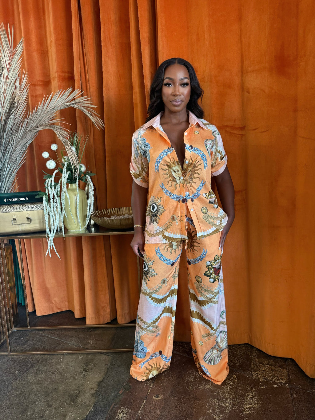 Solar Muse set: orange graphic short-sleeve shirt & wide-leg pants