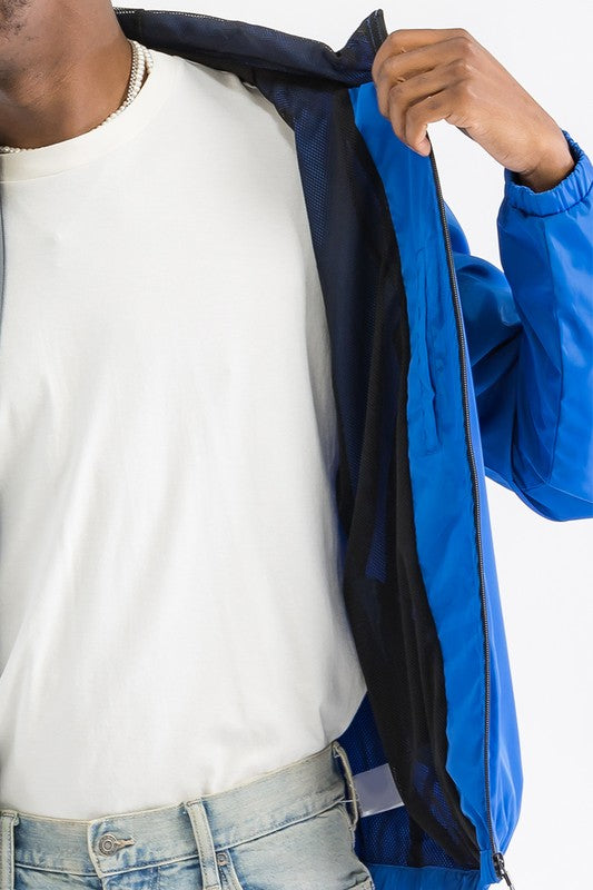 Windbreaker jacket open view showing inner lining and front zipper