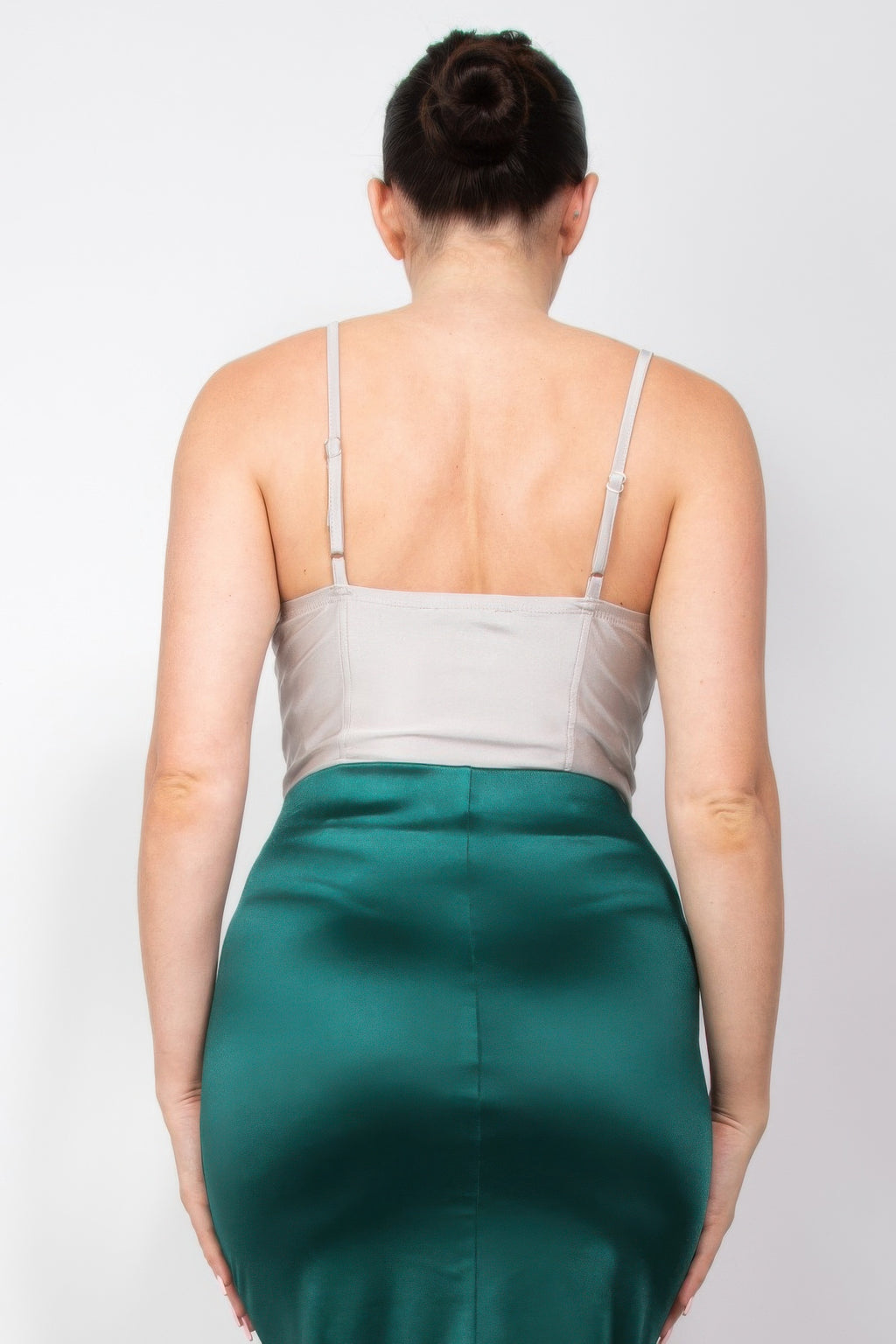 Back view of silvery-white sweetheart cami bodysuit with thin shoulder straps.