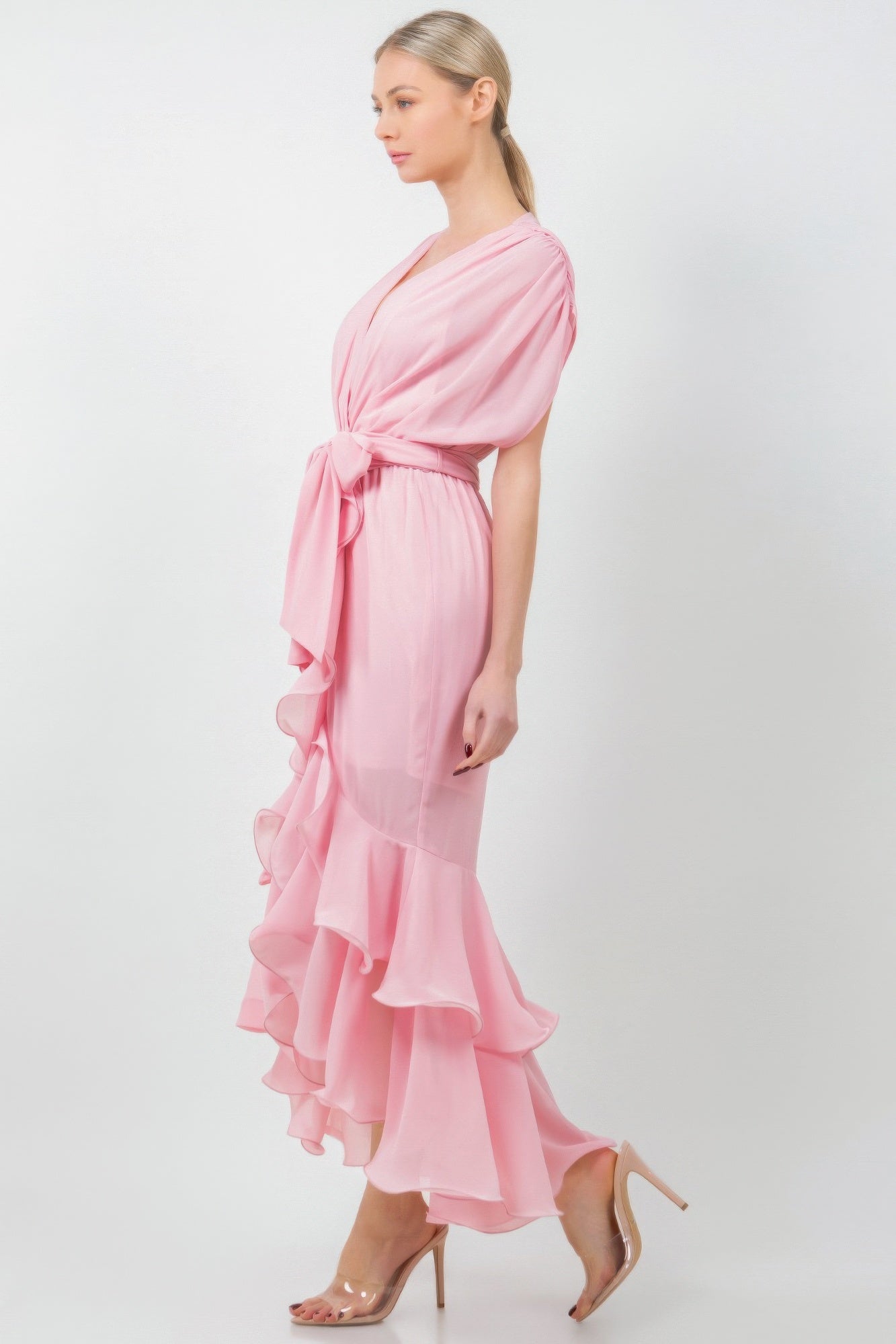 Solid pink midi dress with side-tied waist and tiered ruffle bottom