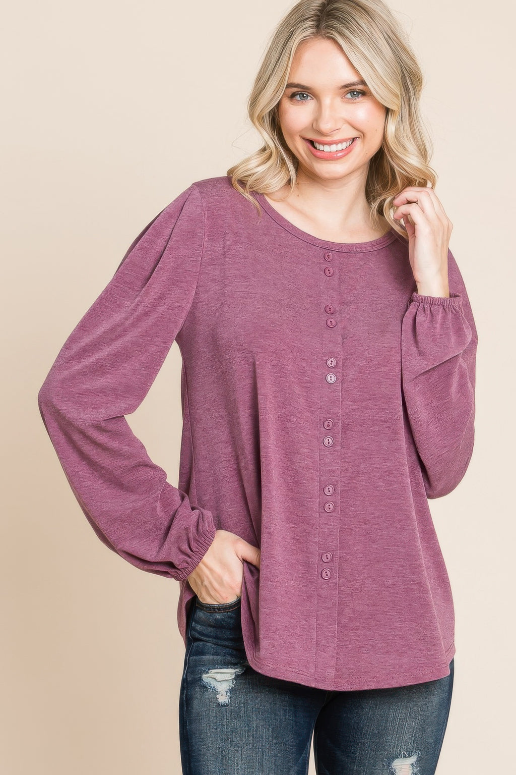 Burgundy long sleeve Henley top with vertical button placket and gathered cuffs