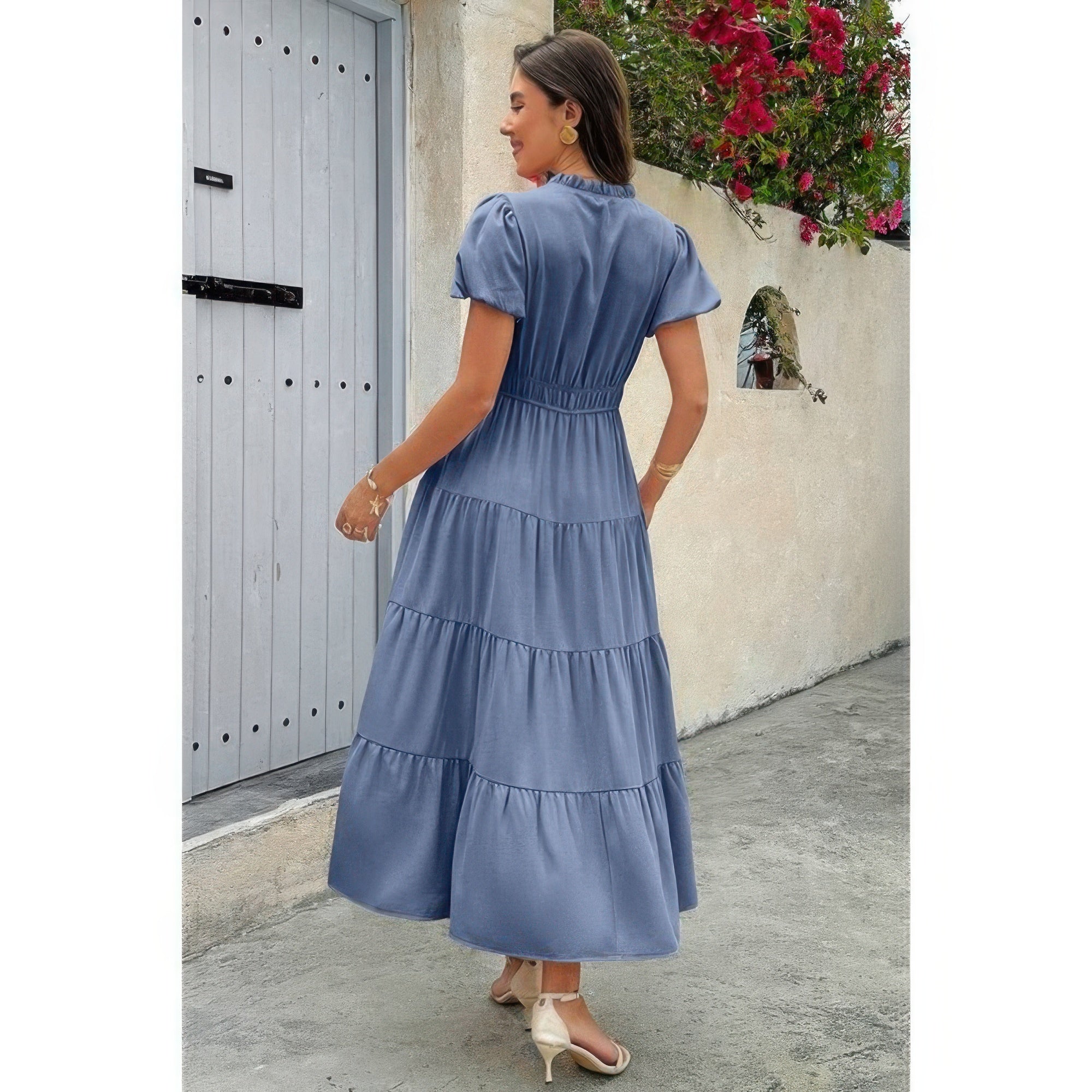 Blue tiered V-neck dress with elastic waist and short puff sleeves