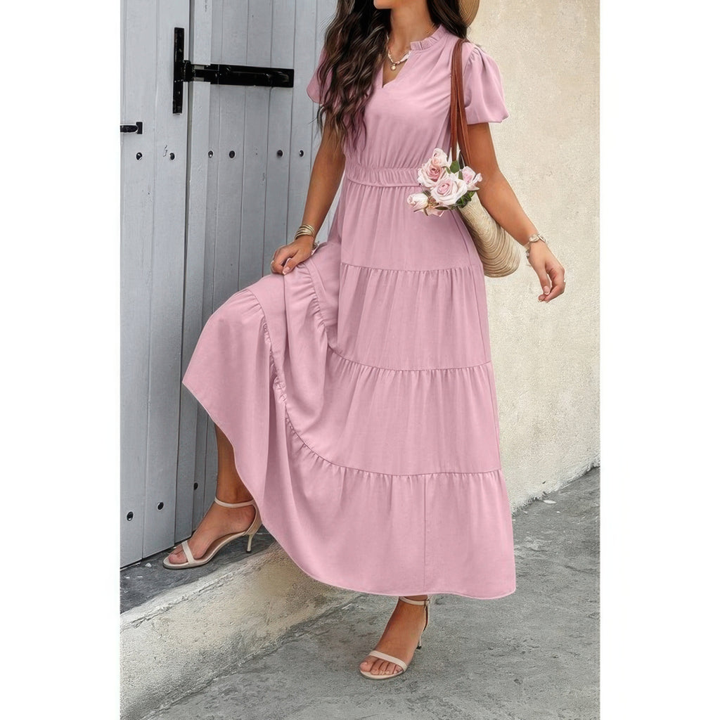Pink V-neck maxi dress with tiered skirt and smocked elastic waist