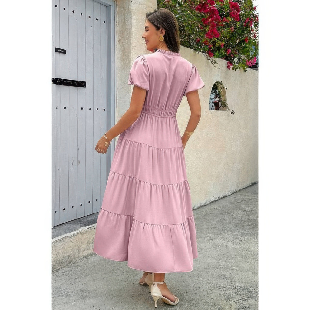Pink tiered maxi dress, V-neck back view with elastic waist and short puff sleeves