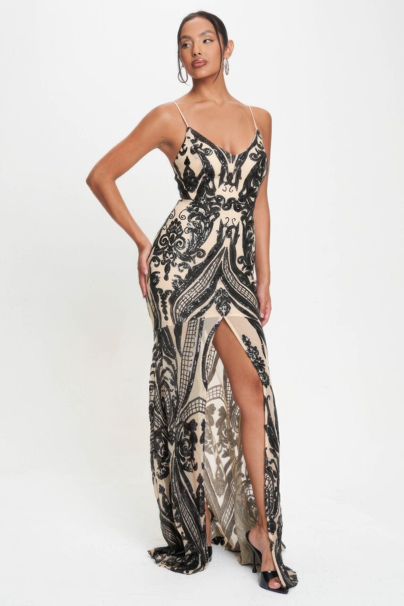 Black art-deco sequin maxi dress with spaghetti straps and front thigh-high slit