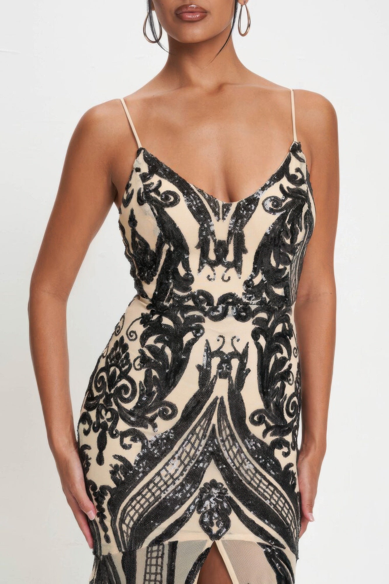 Black sequin bodice with art-deco scrollwork and spaghetti straps
