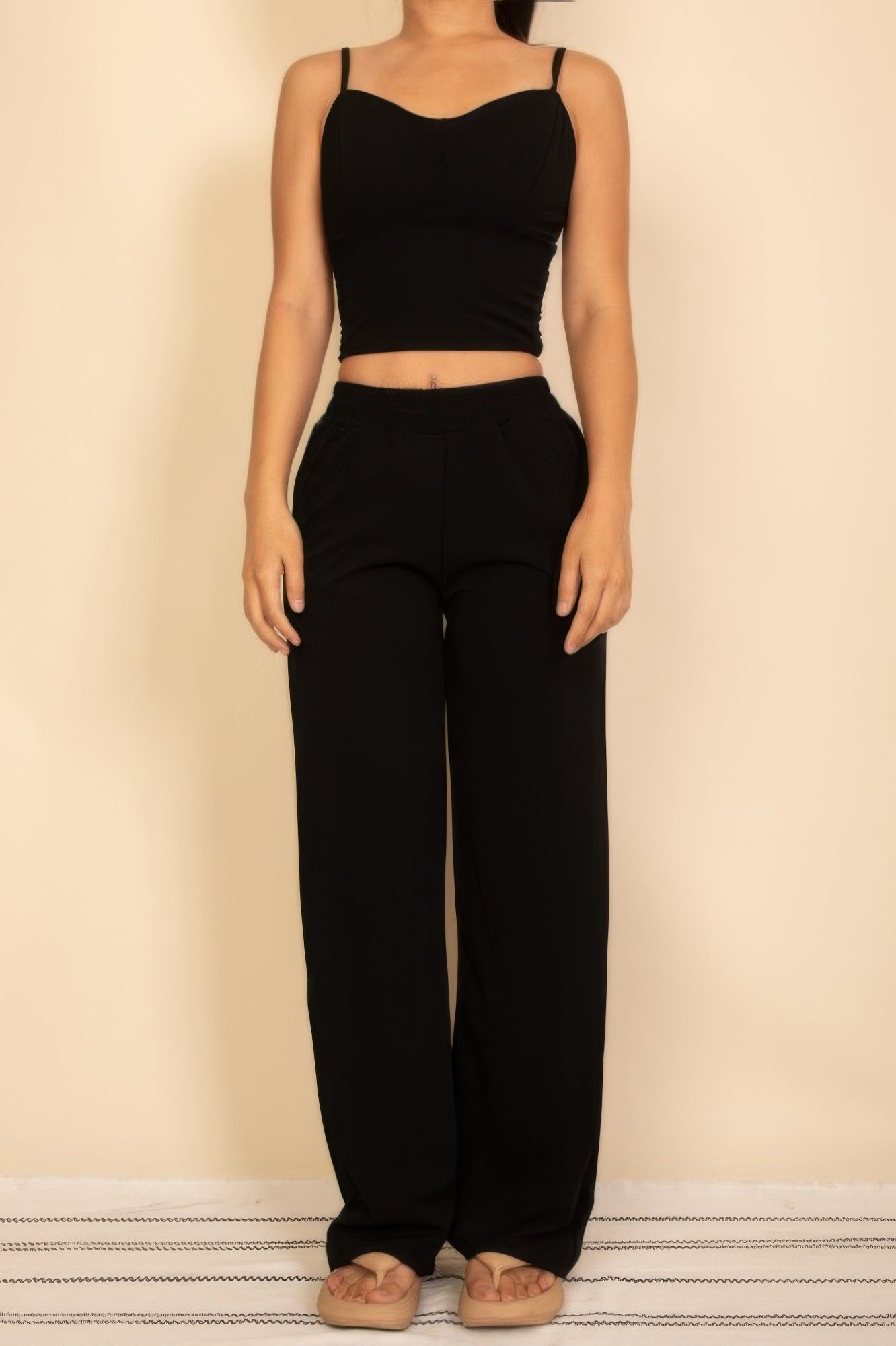 Black spaghetti strap bralette and wide-leg pants set, matching two-piece