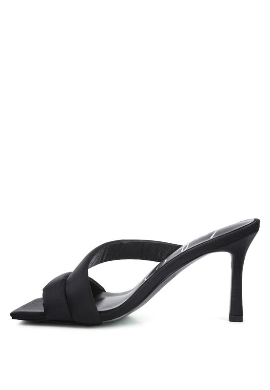 Black mule sandals with cross straps and high stiletto heel