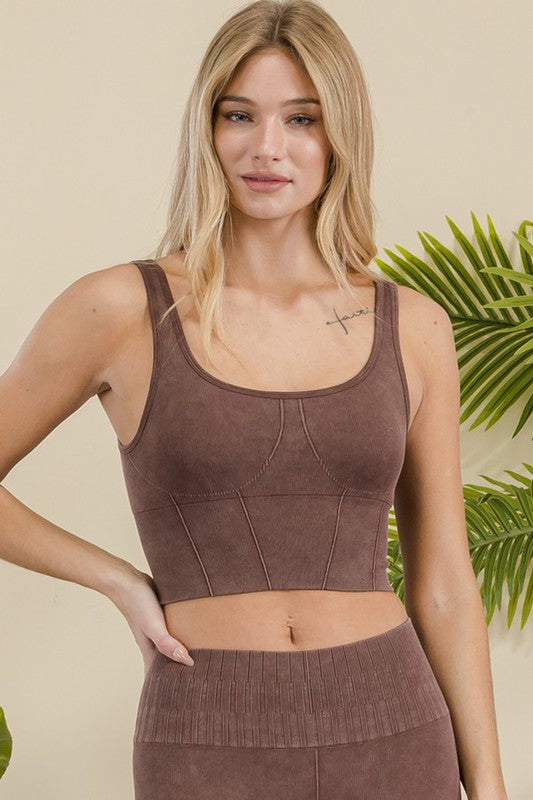 Ribbed sports bra with wide straps and stitched cup panels, coffee-brown color.