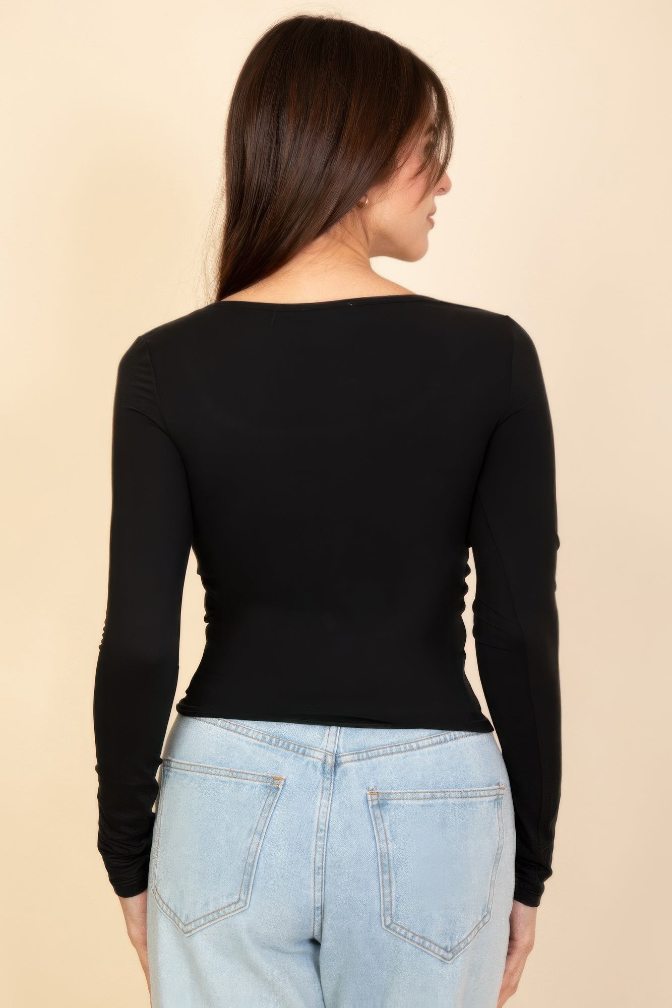 Black square-neck long-sleeve top, back view