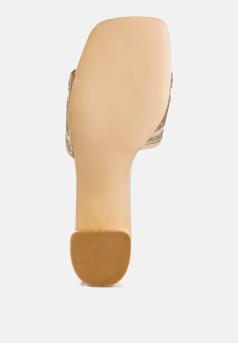 Gold sandal outsole with textured tread and rhinestone edge trim