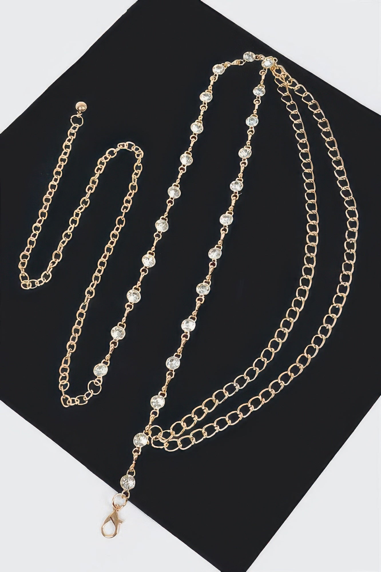 Goldfarbener Layered Belt mit mehreren Kettenlagen und länglichem Kettenzipfel mit Haken