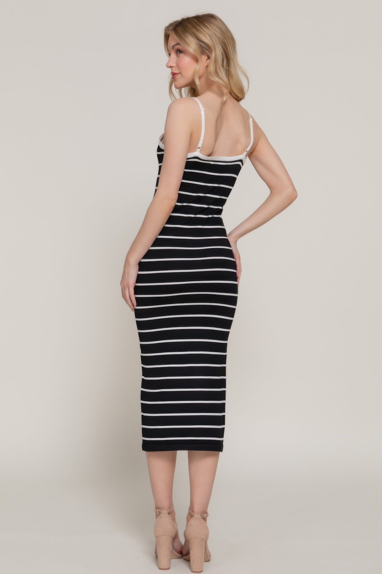 Black and white striped midi sweater dress, thin straps, side profile, fitted