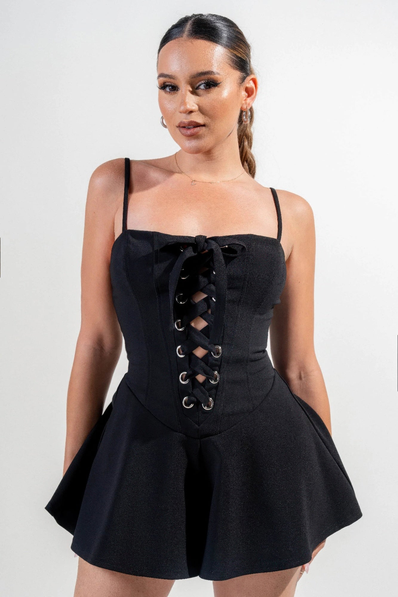 Stretch Woven Jumpsuit in black with front lace-up corset and spaghetti straps